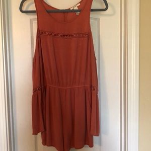 Pink Romper. Long sleeve with pockets. Worn once